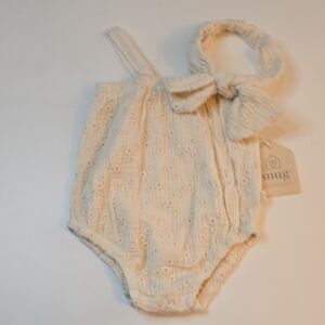 Snug Cream Baby Romper with Bow